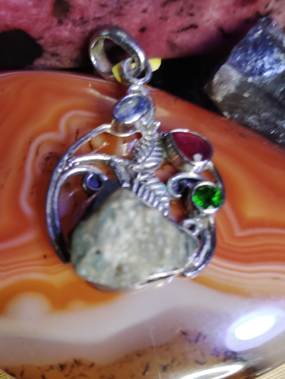 STERLING SILVER PENDANT WITH TANZANITE, RUBY, EMERALD ACCENTS. PEND. ONLY.